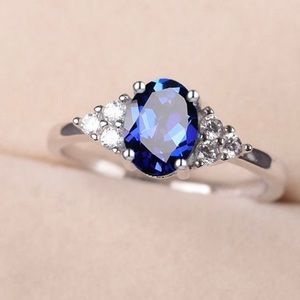 925 Lab Created Sapphire and White Topaz Ring